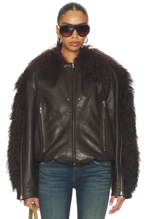 Front studio view of a dark brown leather coat fully zipped, displaying silver exposed zippers, dual vertical side zip pockets, collar drawstrings, and thick faux fur sleeves.