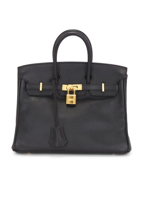 Front studio view of a black calfskin mini top-handle handbag featuring gold-tone hardware, turnlock closure, attached key clochette, and padlock against a plain white background.