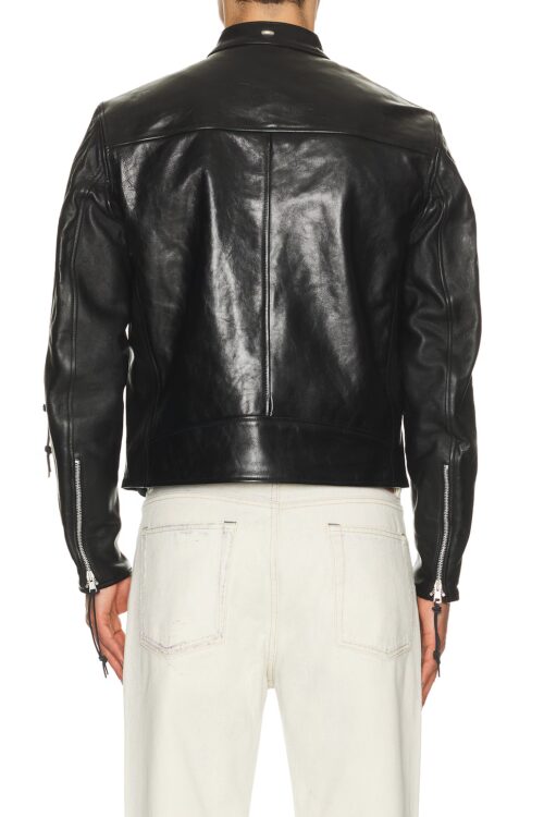 The back view of a person wearing a black leather jacket, highlighting the clean horizontal shoulder yoke panel, center back seam, and distinctive zipper details with pulls on the sleeves.